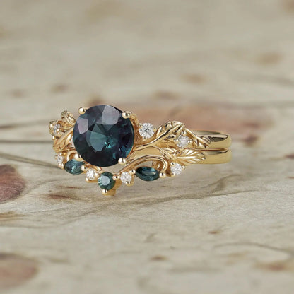 Round Cut Teal Sapphire Ring with Elegant Leaf Motif - Octavia
