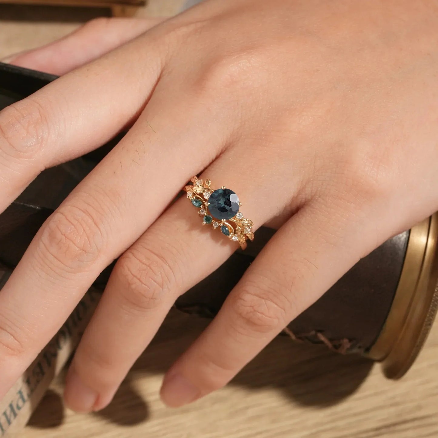 Round Cut Teal Sapphire Ring with Elegant Leaf Motif - Octavia