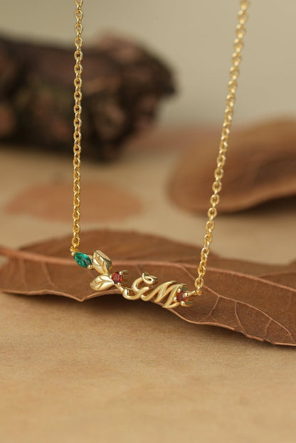 Signature: Christmas Garnet and Emerald Necklace - GemsMagic
