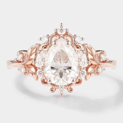 Leaf Inspired Pear Cut Moissanite Engagement Ring – Customized with Ruby Accent Stones For Leandro
