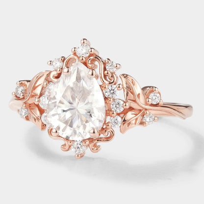 Leaf Inspired Pear Cut Moissanite Engagement Ring – Customized with Ruby Accent Stones For Leandro