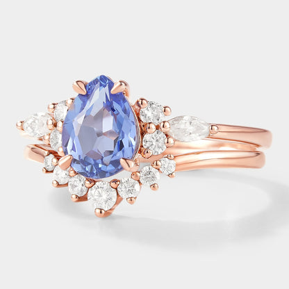 Pear Cut Cornflower Sapphire Engagement Ring With Curved Wedding Band