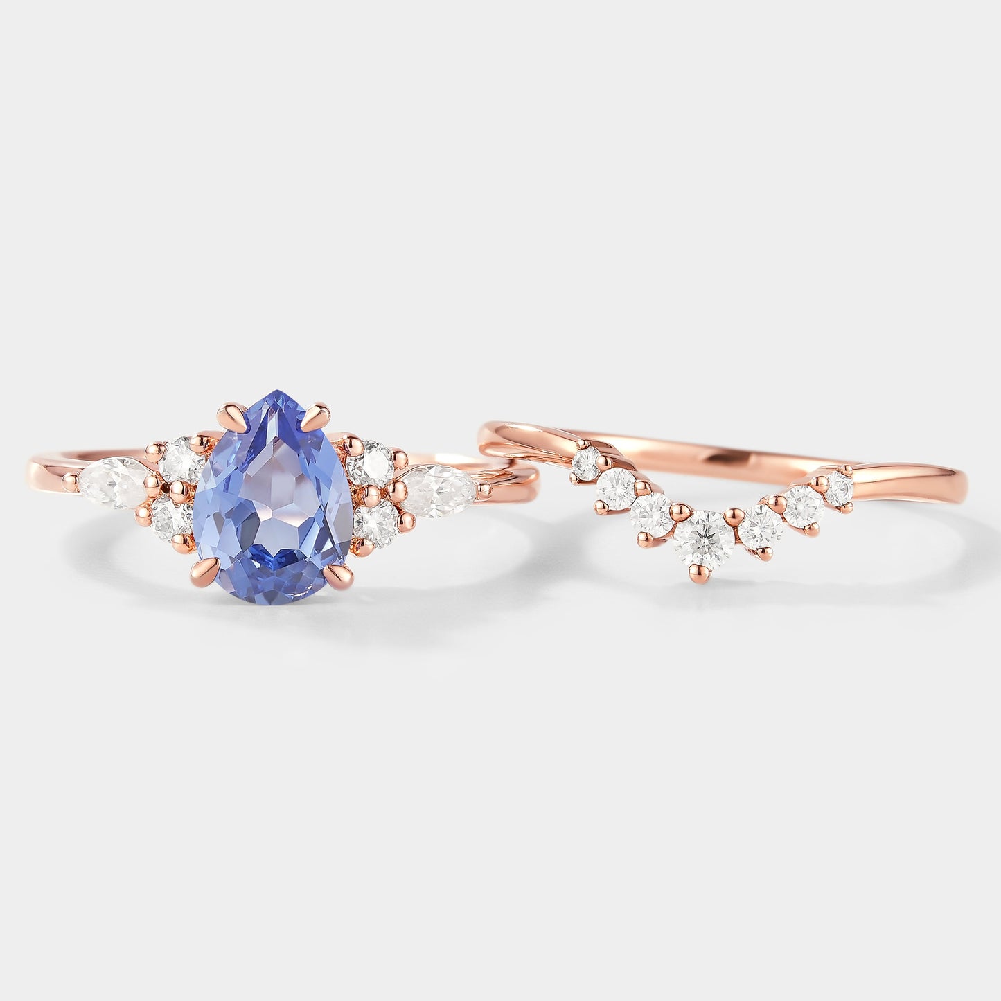 Pear Cut Cornflower Sapphire Engagement Ring With Curved Wedding Band