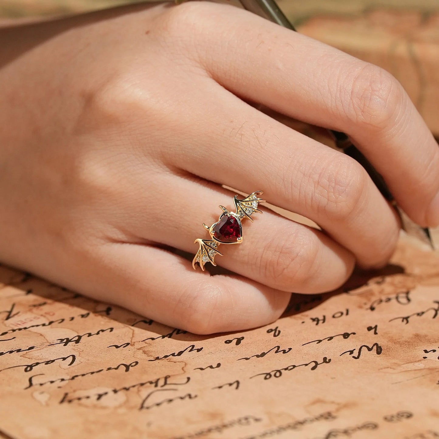 Unique Heart Cut Ruby Bat Inspired Engagement Ring